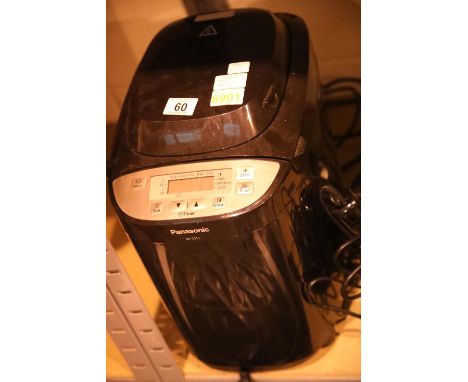 Wahl hairdryer, heated brush and a Panasonic bread maker. Not available for in-house P&PCondition Report: All electrical item