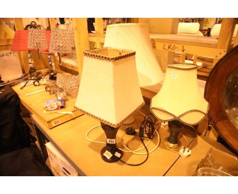 Three ceramics and wood table lamps with shades. Not available for in-house P&PCondition Report: All electrical items in this