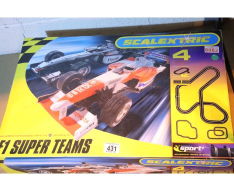 F1 Super Team Scalextric 4 boxed set. Not available for in-house P&amp;P 