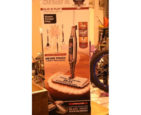 Boxed shark steam mop. Not available for in-house P&PCondition Report: All electrical items in this lot have been PAT tested 