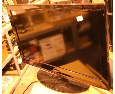 Samsung 37" flat screen TV on stand. Not available for in-house P&PCondition Report: All electrical items in this lot have be