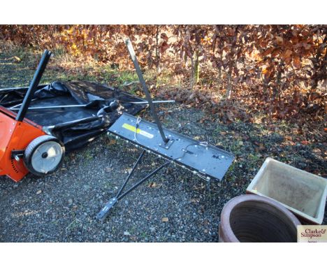 A Handy garden lawn dethatcher with instruction manual