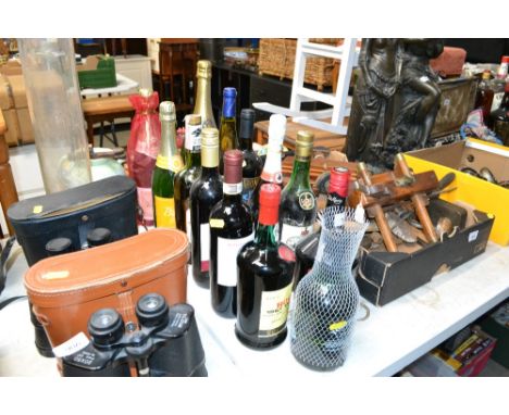 A quantity of various alcohol to include Rochas port, Stuart's Scotch American whiskey etc