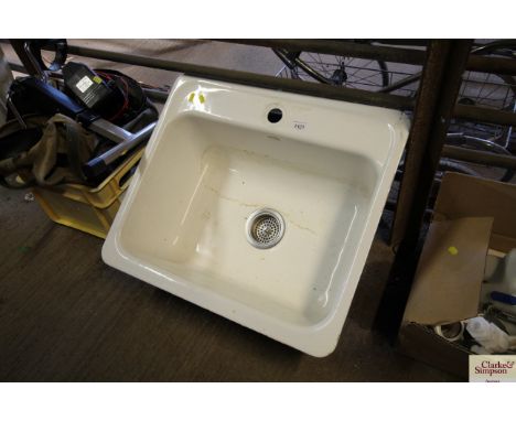 A cast iron and enamel sink