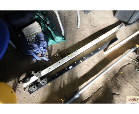 Two large metal sash clamps