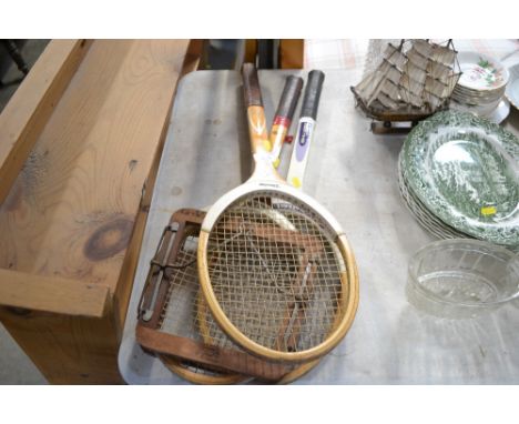 Three vintage tennis racquets