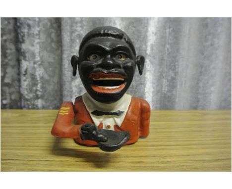 CAST IRON/ MONEY BOX - A vintage novelty painted cast iron mechanical money box in good condition, with no visible makers mar