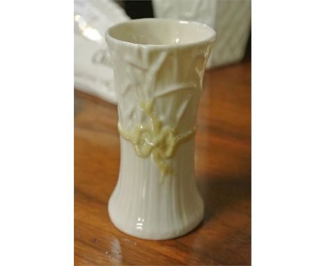 BELLEEK/CERAMIC/IRISH: A Belleek small posy vase in tree trunk form with ribbon detail. 6th period 3rd green mark 1965-1981. 