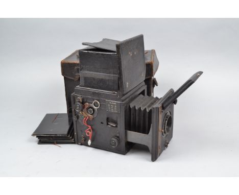 A Butcher Popular Pressman Reflex Camera, shutter fires, body F-G, four small screw holes to top, an owner's homemade trailin