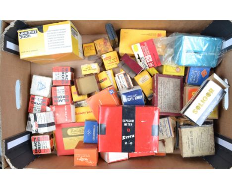 A Tray of Photographic Accessories and Materials, including a Stitz exposure meter, Unomat electronic flash, a Paterson slide