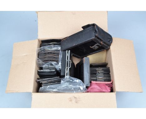 A Box of Double Dark Slides and Plate Backs, various sizes and makers including A.P. Paris, a Graflex Graphic film holder for