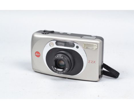 A Leica Z 2X Compact 35mm Camera, serial no. 2 374 249, titanium colour, body G, powers up, lens extends &amp; retracts, flas