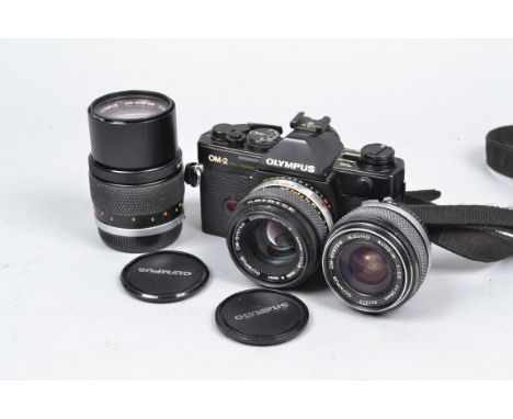 A Black Olympus OM-2 Spot/Program Camera and Lenses, serial no 1 017 160, untested, a Zuiko Auto-S 50mm f/1.8, Auto-W 28mm f/