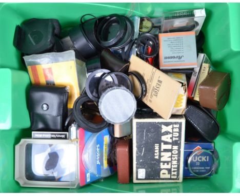 A Box of Camera Related Accessories, including light meters, filters, hoods, rings and other items
