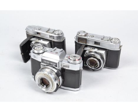 A Zeiss Ikon Contaflex and Two Kodak Retina Folding Cameras, A Contaflex Super B SLR camera, shutter and mirror stuck, a Reti
