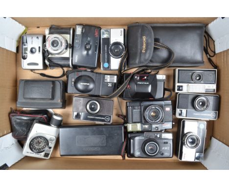 A Tray of Compact Cameras, including a Canon Dial 35, an Olympus XA 2, Pentax PC35 af, other compacts and some Instamatic exa