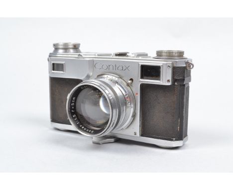 A Zeiss Ikon Contax II Camera, shutter sticking, body F-G, some blistering under leatherette, with Carl Zeiss Jena 5cm f/1.5 