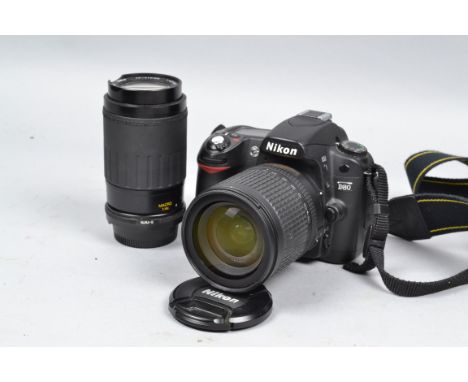 A Nikon D80 DSLR Camera, serial no. 8 076 512, body VG, powers up, apparently working, with a DX AF-S Nikkor 18-135mm f/3.5-5