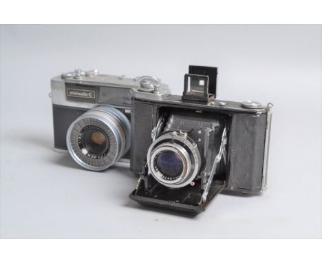 A Zeiss Ikon Ikonta 521/16 Folding Camera, 6 x 6cm, body F, shutter sticking below 1/25s and body release sluggish, Novar Ana