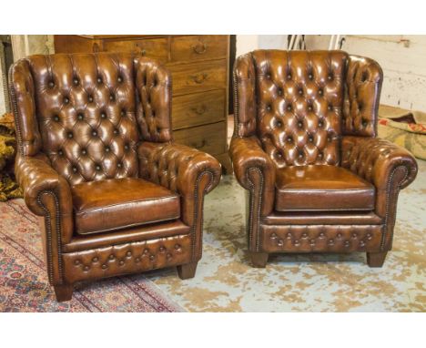 WING ARMCHAIRS, a pair, George III style button upholstered in faded tan leather and tapering supports, 85cm W. (2)
