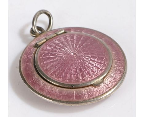 Continental silver and lilac enamel miniature powder compact, of circular form with hanging loop, the hinged lid opening to r