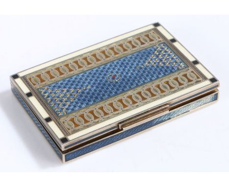 Austrian silver box and cover, of rectangular form with engine turned blue enamel centre flanked by two clear and silver roun