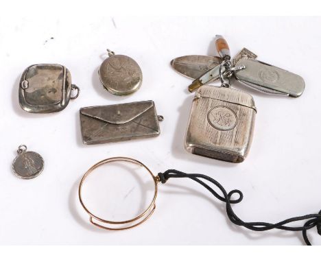 Silver vesta case hung with various fobs including a Joh. Engstrom miniature folding penknife, silver stamp case in the form 