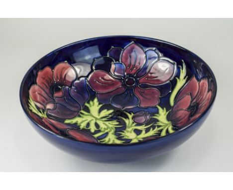 Walter Moorcroft Large Tube lined Footed Bowl ' Clematis ' Design on Blue Ground. c.1990's. 3.5 Inches High, 10.25 Inches Dia
