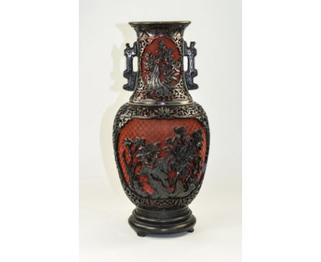 Chinese - Early 20th Century Black and Red Cinnabar Twin Handled Vase, Overlaid with Floral Decoration, The Interior of Vase 