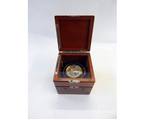 Waltham brass travelling clock in the form of a ship's clock, with eight-day movement, on gimbals, in mahogany case 