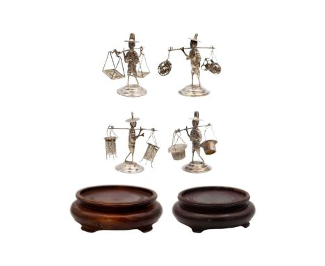Four silver Chinese worker figures place setting holders. Signed and stamped sterling, 6cm tall, 1.828 oz; with two wooden st