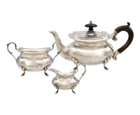 A George V silver bachelor three piece tea set by Goldsmiths & Silversmiths Co Ltd. London 1915, width of teapot 19.5cm, 14.5