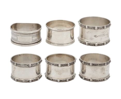 A modern silver set of four heavy napkin rings by Adie Brothers Ltd. Birmingham 1956; together with two other silver hallmark