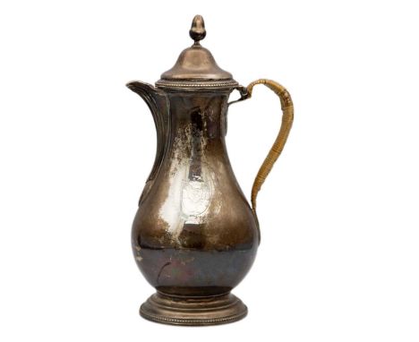 A George III silver coffee pot by Robert Makepeace & Richard Carter. Of baluster form with domed hinged lid with an acorn fin
