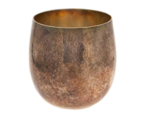 A contemporary silver beaker by Charles Francis Hall. Of ovoid form with hammered finish, London 2017, height 7cm, 3.71 oz.Ha