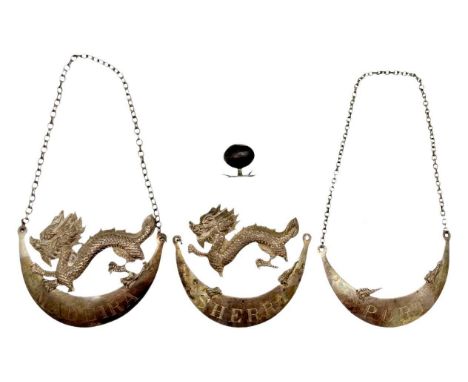 A set of three Chinese silver wine labels by Wang Hing. Two with dragon surmounts, inscribed 'PORT', 'MADEIRA' and 'SHERRY', 