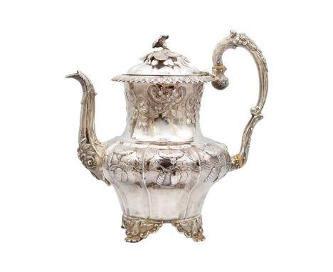 A good William IV silver Rococo-style hot water pot by J E Terrey & Co. With with floral bindweed flower scroll embossed deco