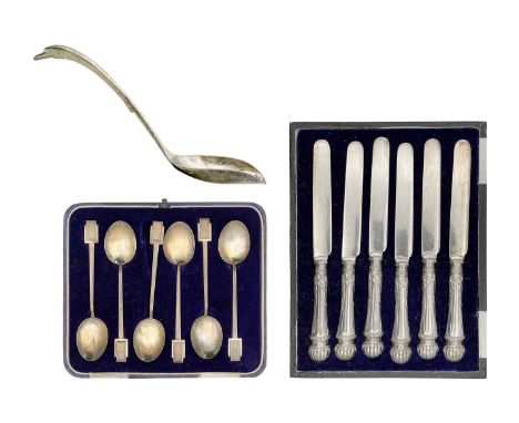 An unusual heavy sterling silver modernist sauce spoon with swan head finial. Stamped STERLING 925, makers mark, length 21cm,