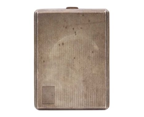 A silver cigarette case with gilded interior. Engine turned decoration, engraved dedication inside, London 1934, 11.5 x 8.4cm