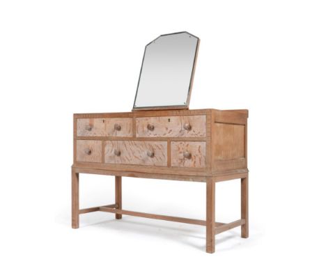 An Art Deco Limed Oak Bedroom Suite, all with geometric repeating pattern and shaped square handles, comprising a Double Door