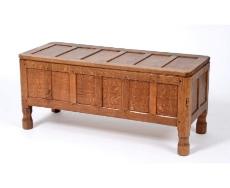 A Robert ''Mouseman'' Thompson Panelled Oak Blanket Box, on four octagonal feet, with carved mouse signature, 105cm by 42cm, 