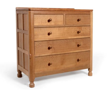 A Robert ''Mouseman'' Thompson Oak Chest of Drawers, with raised upstand, above two short over three graduating drawers, on f