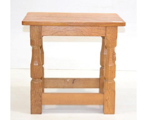 A Robert ''Mouseman'' Thompson Oak Stool/Coffee Table, on four octagonal legs joined by four low level rails, with carved mou