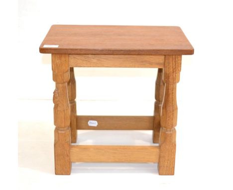 A Robert ''Mouseman'' Thompson Oak Stool/Coffee Table, on four octagonal legs joined by four low level rails, with carved mou