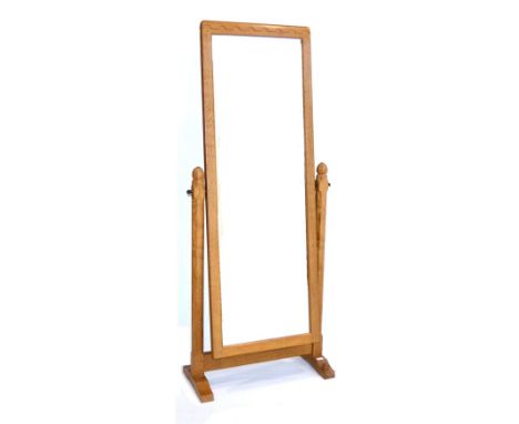 A Robert ''Mouseman'' Thompson 5ft Oak Long Dressing Mirror, with a rectangular mirror, pivoting on a central axis between a 