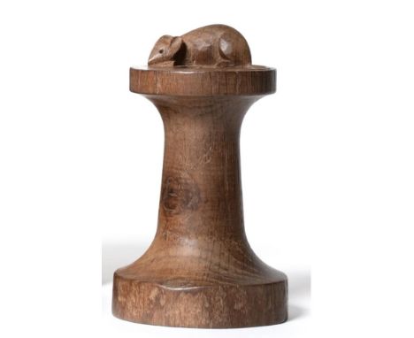 A Robert ''Mouseman'' Thompson Oak Candlestick, circa 1948, of bobbin form, with carved mouse signature, 15cm