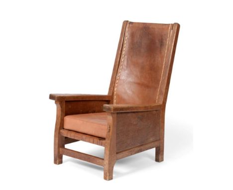 A Robert ''Mouseman'' Thompson Oak Smoker's Chair, with slung cow hide back and interwoven leather seat, with loose cow hide 