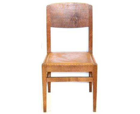 A Robert ''Mouseman'' Thompson Oak Chapel Chair, with shaped back, book rest, on four tapering square section legs, joined by