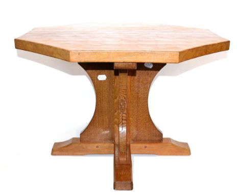 A Robert ''Mouseman'' Thompson Oak Octagonal Coffee Table, on a cruciform base, with carved mouse signature, 76cm diameter, 4