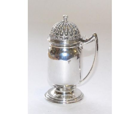 An Arts & Crafts Mustard Pot, by Omar Ramsden, London, 1938, hammered finish, with architectural domed lid, the base with app